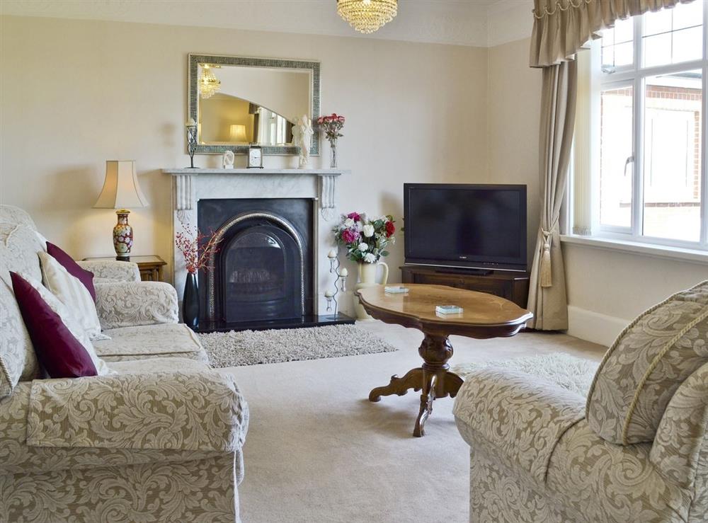 Living room/dining room at Toll Cottage in Carisbrooke, near Newport, Isle of Wight