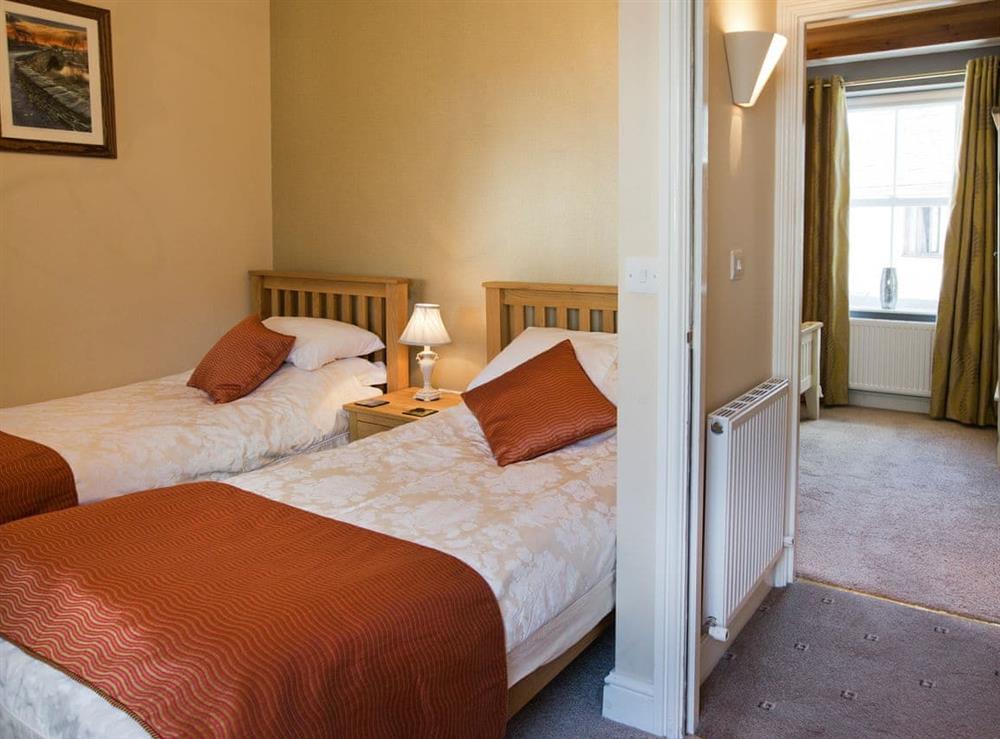 First floor twin bedroom at Tommys Cottage in Keswick, Cumbria
