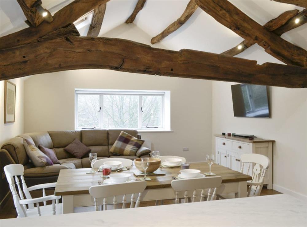 Historic exposed wooden beams throughout the living area at Toms Barn in Hebden, near Skipton, North Yorkshire