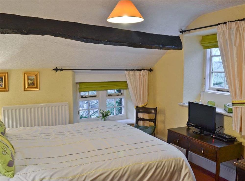 Double bedroom with king size bed (photo 2) at Toms Cottage in Dalton-in-Furness, Cumbria