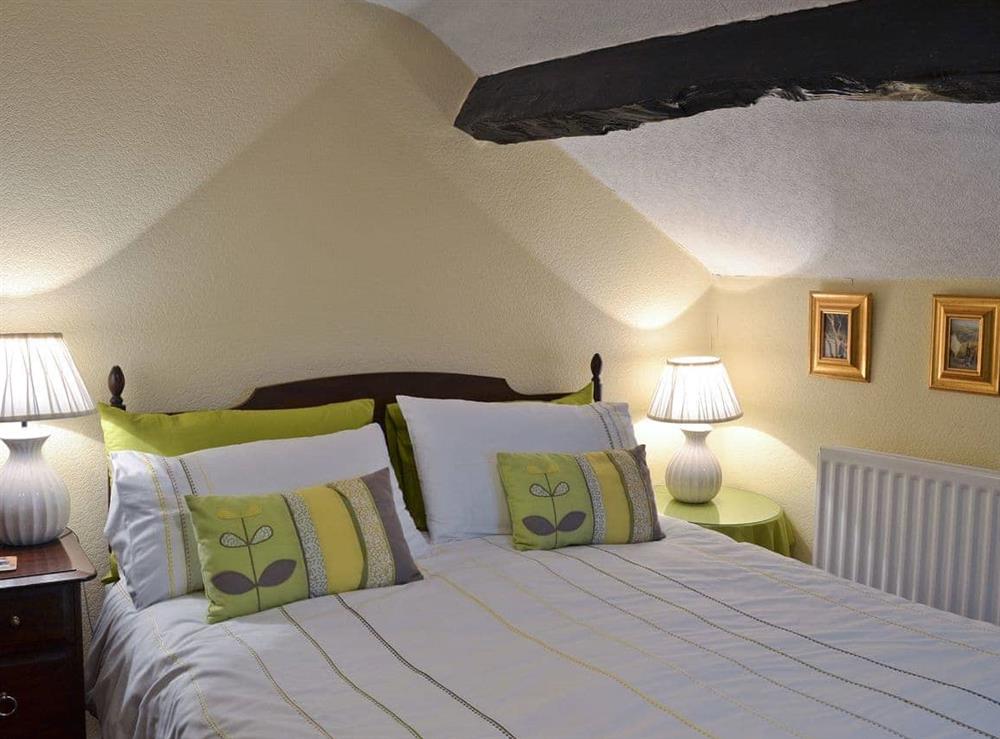 Double bedroom with king size bed at Toms Cottage in Dalton-in-Furness, Cumbria