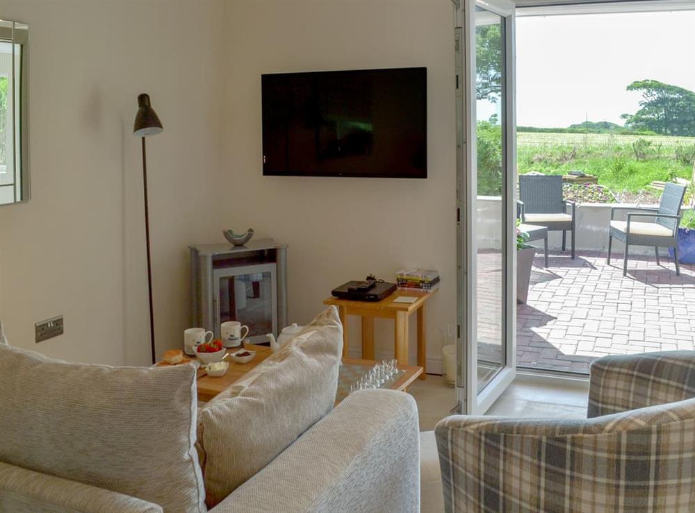 Light and airy living area at Tontos View in Sorley Green Cross, near Kingsbridge, Devon