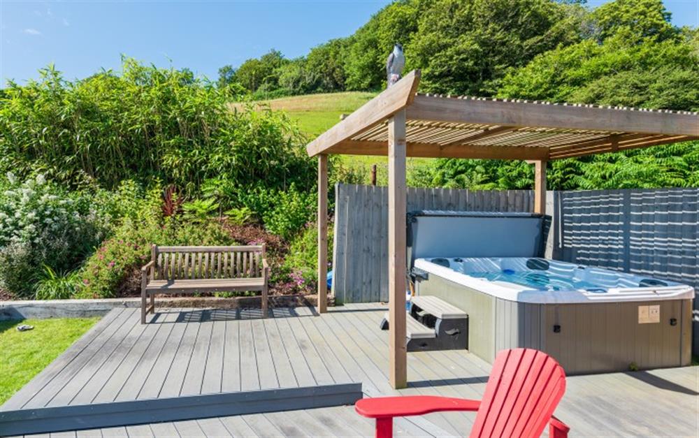 The deck and hot tub-perfect for relaxing under the stars at Toorak in Torcross