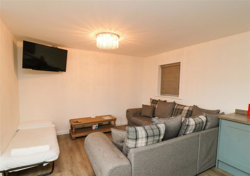 Relax in the living area at Toote Suite, High Leven