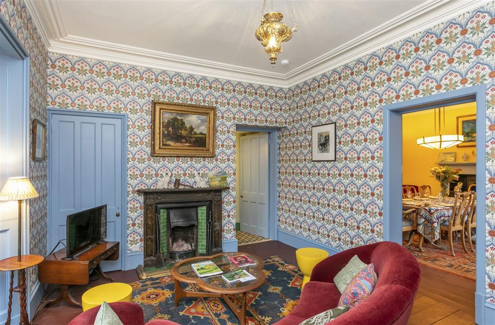 Sitting room featuring an ornamental fireplace