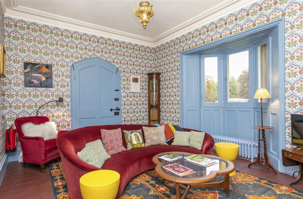 The sitting room is flooded with natural light