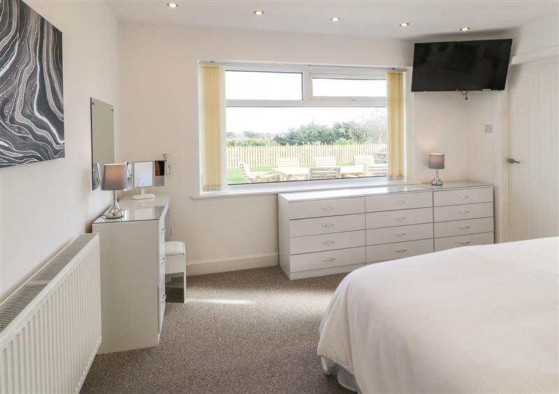 One of the 4 bedrooms at Top Of The Lane Holiday Apartment, Benllech