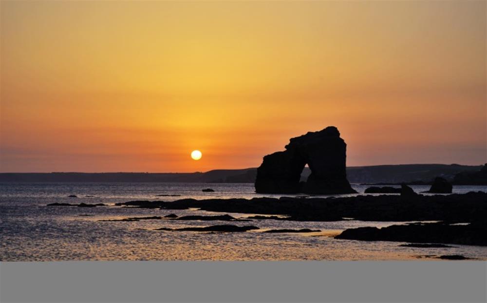 Sunset by Thurlestone Rock at Top Storey in Dartmouth