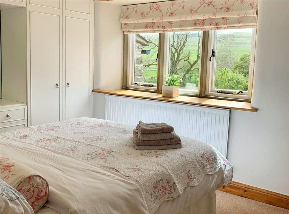 Comfortable double bedroom with wonderful views at Tophams Laithe in Conistone with Kilnsey, Grassington, North Yorkshire