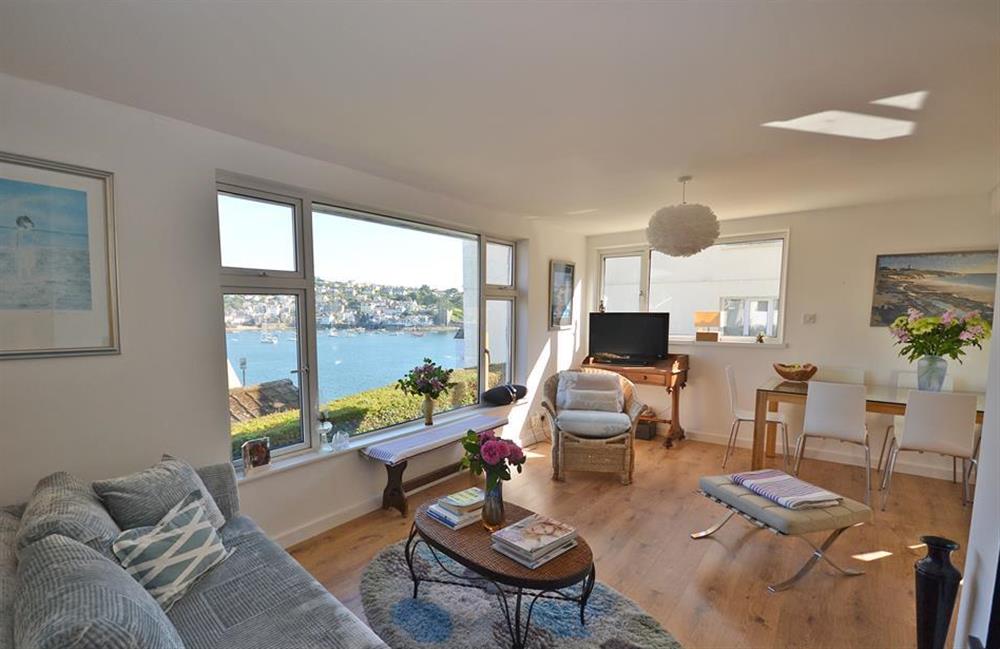 The living/dining room with views along the estury and out to sea at Topsides, Fowey