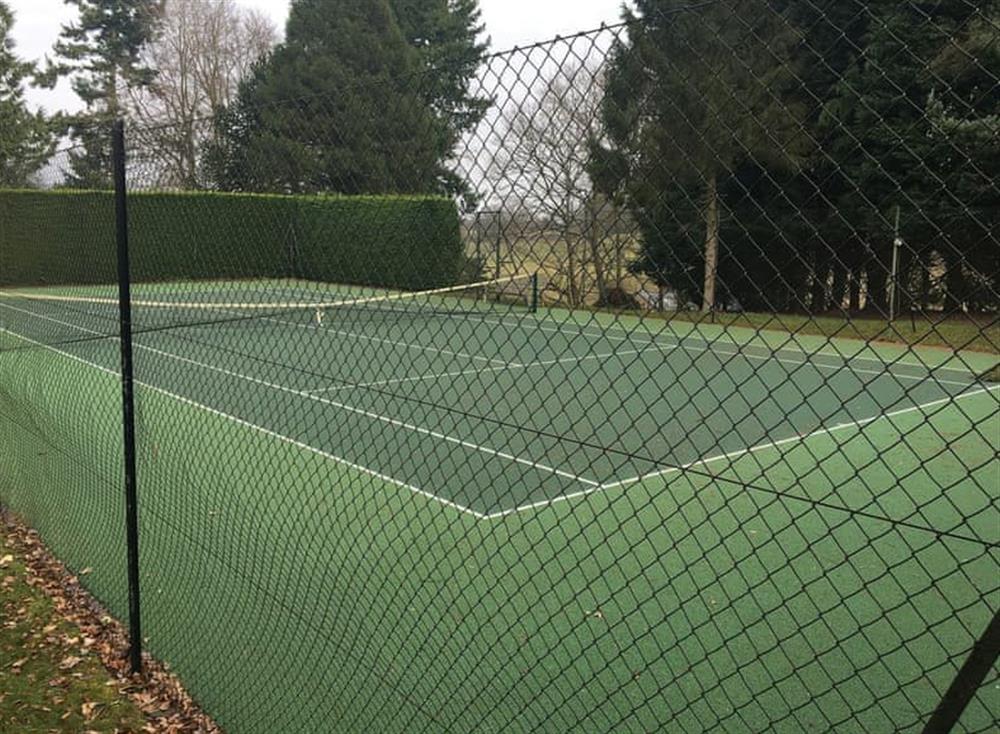Tennis court at Tor Hatch in Guildford, Surrey