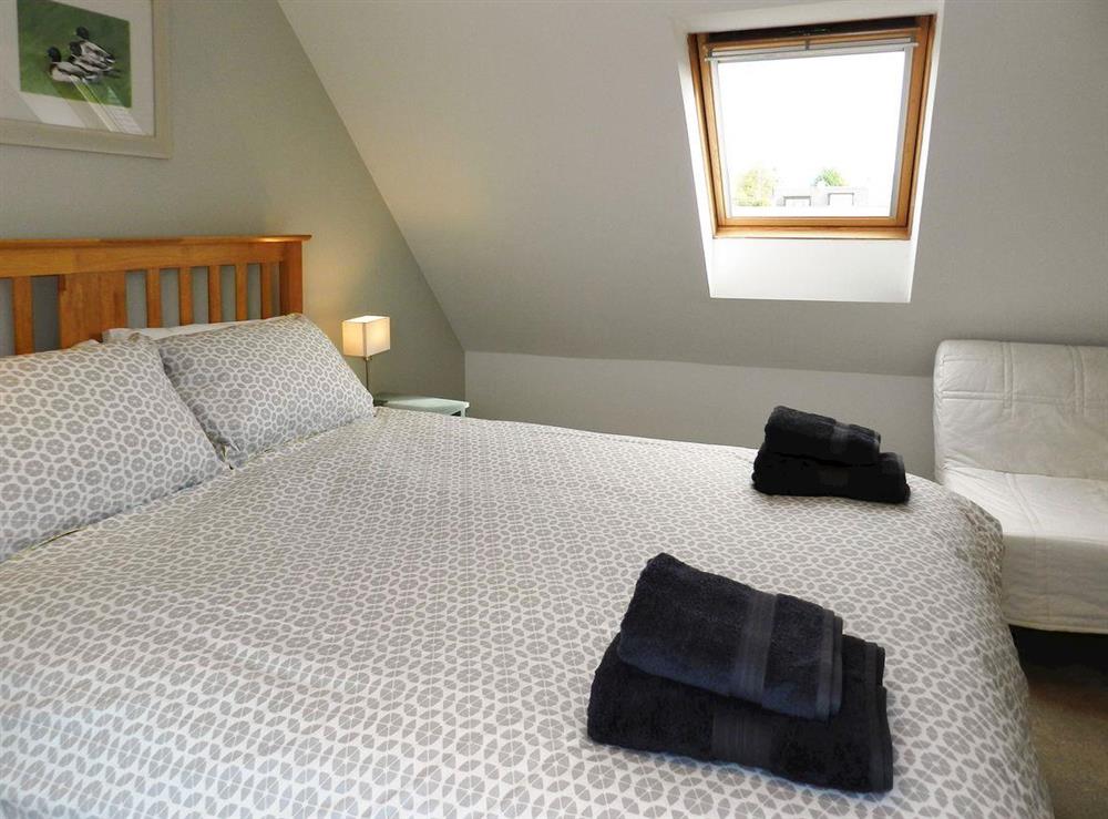 Comfortable double bedroom at Torbeg Farm Cottage in Torbeg, near Blackwaterfoot, Isle of Arran, Scotland