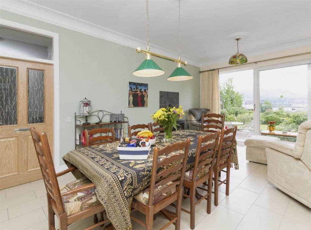Large dining room with patio doors at Torfern in Corpach, near Fort William, Inverness-Shire