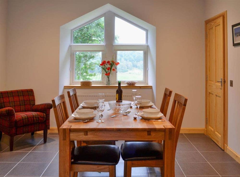 Elegant dining room with original architectural features at Tornahatnach in Glenkindie, near Alford, Aberdeenshire