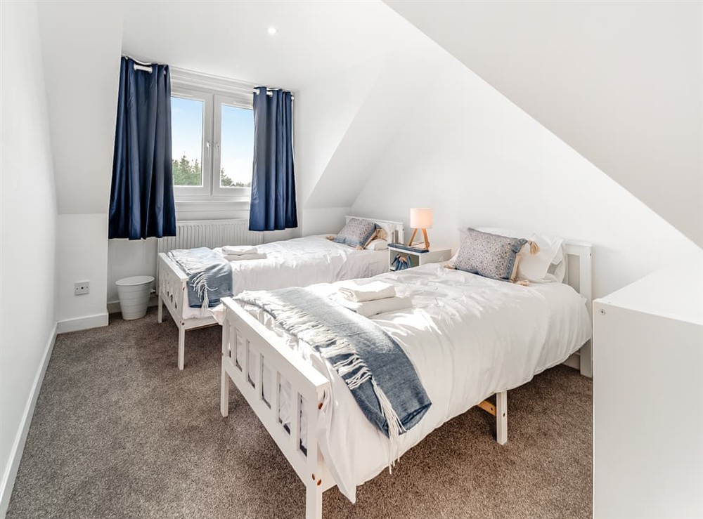 Twin bedroom at Torr Cottage in Dalrymple, Ayrshire