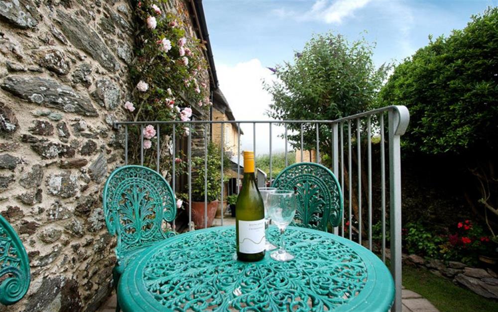 Relax in the summer sun with a cool glass of wine. at Torrings Barn in East Prawle