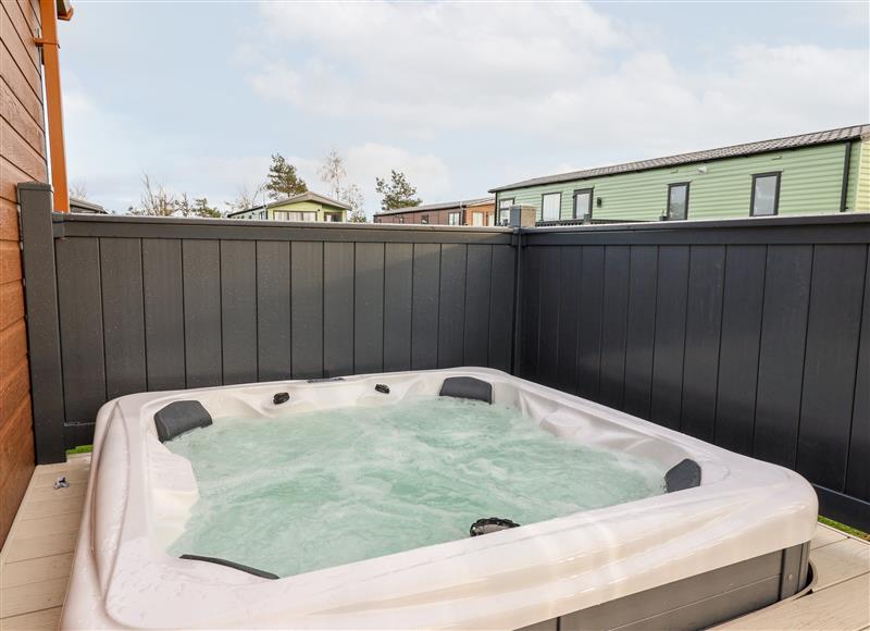There is a hot tub at Tortworth Lodge, Heslerton near Sherburn