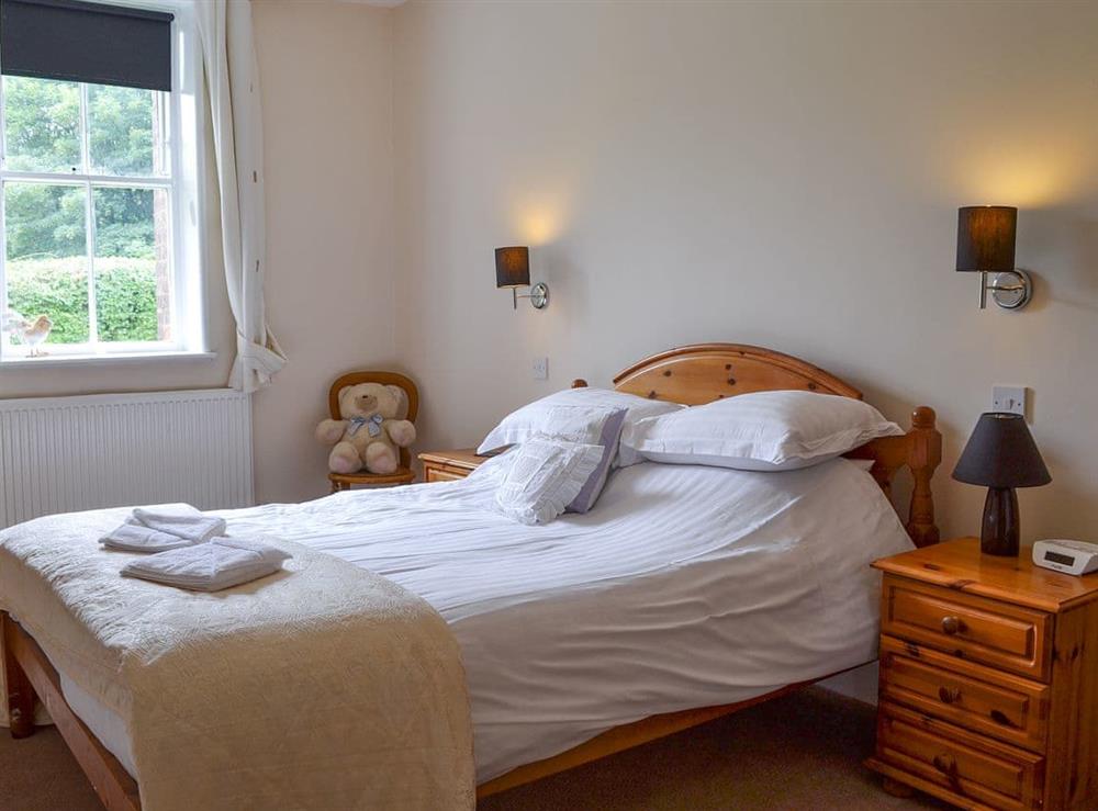 Inviting and romantic double bedroom at Station Masters House, 