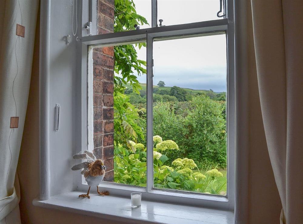 Wonderful views of the fells from the double bedroom at Station Masters House, 
