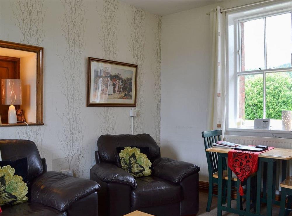 Cosy living area with original features at Ticket Office, 