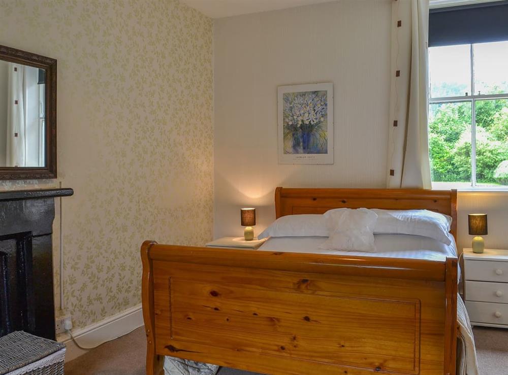 Warm and inviting double bedroom at Ticket Office, 