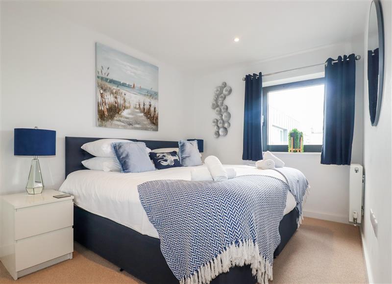 A bedroom in Towan Penthouse at Towan Penthouse, Newquay