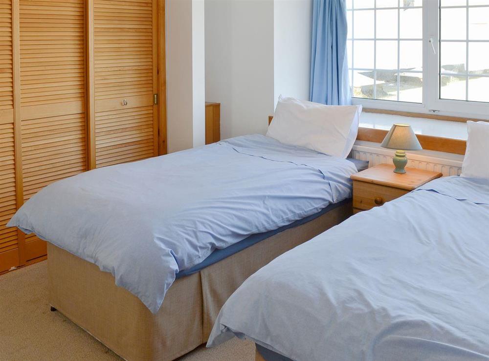Cosy twin bedroom at Towan View Loft in Newquay, Cornwall