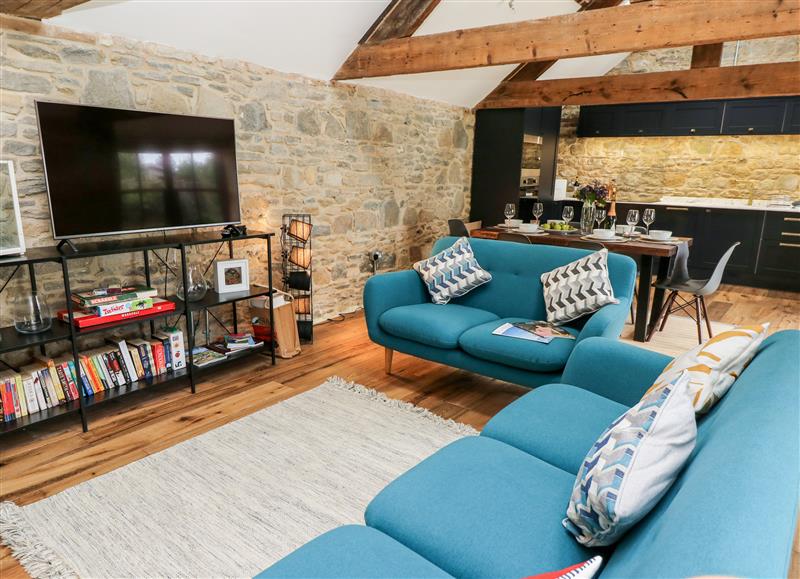 Enjoy the living room at Tower Barn Cottage, Ryde
