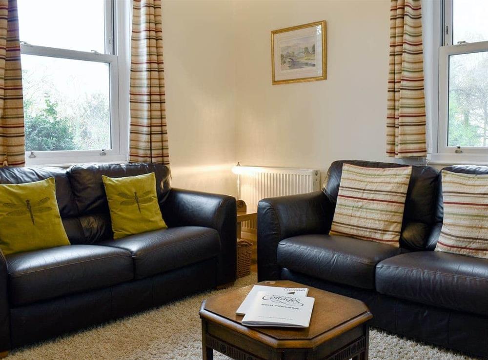 Comfy seating within living room at Tower View in Beech Hill, near Bowness-on-Windermere, Cumbria