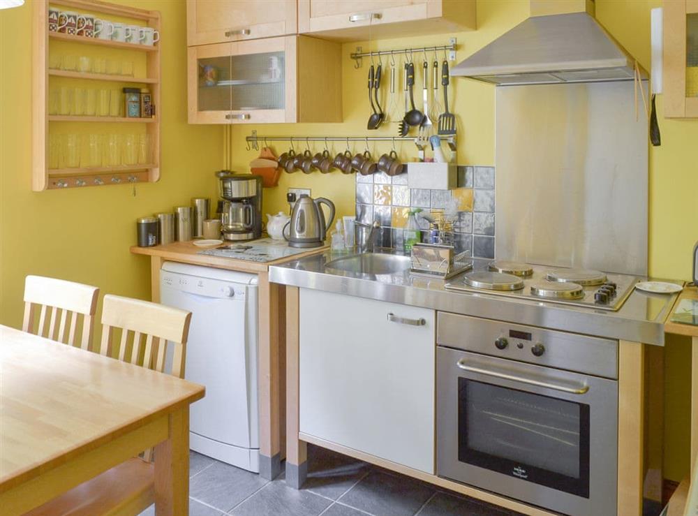 Well-equipped kitchen with dining area at Tower View in Beech Hill, near Bowness-on-Windermere, Cumbria