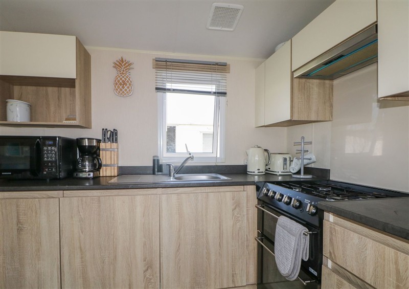 This is the kitchen at Tower View Number 34, Pevensey Bay