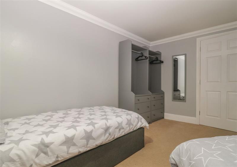 A bedroom in Townbridge Apartment at Townbridge Apartment, Weymouth