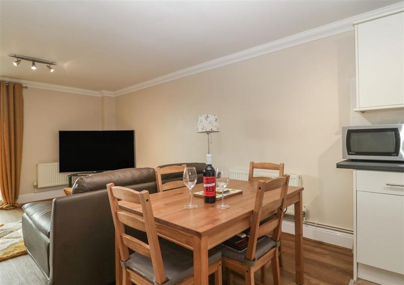 Relax in the living area at Townbridge Apartment, Weymouth
