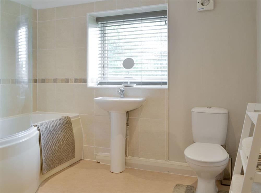 Family bathroom with shower over bath at Townend Cottage in Soulby, near Kirkby Stephen, Cumbria