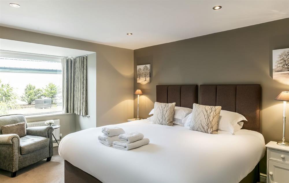 First floor: Bedroom with 6ft super king bed that can be configured as twin beds on request at Townhouse No. 5, Burneside, near Kendal