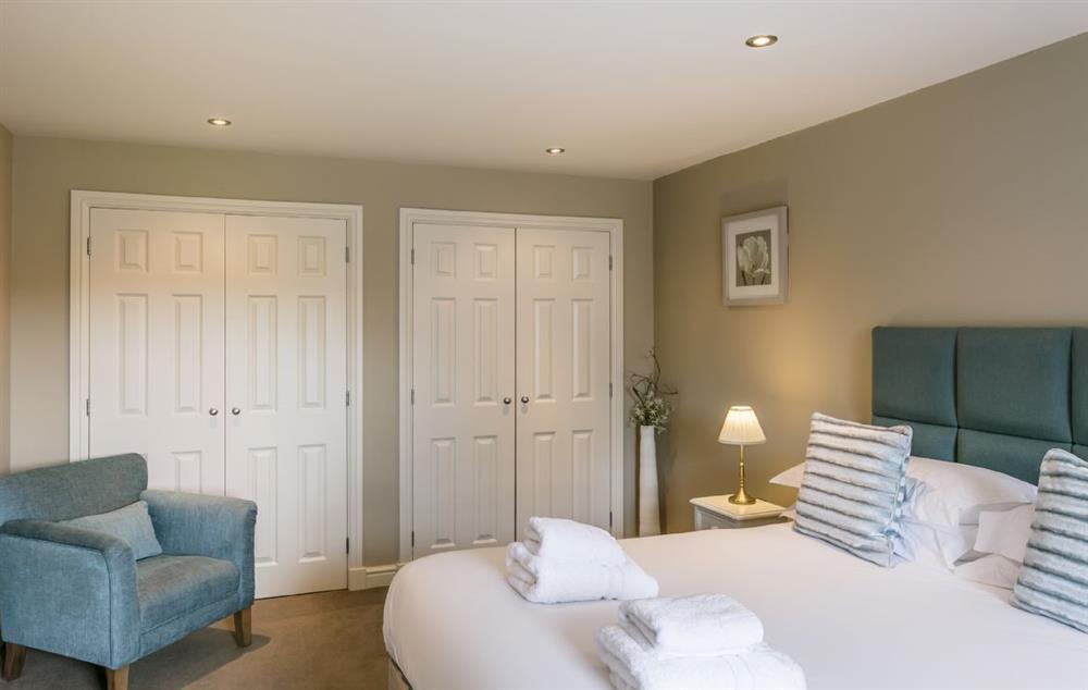 Ground floor: Bedroom with 6ft super king bed that can be configured as twin beds on request (photo 2) at Townhouse No. 6, Burneside, near Kendal