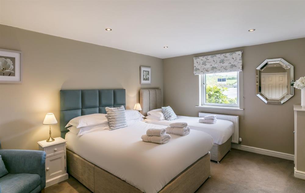 Ground floor: Bedroom with 6ft super king bed that can be configured as twin beds on request at Townhouse No. 6, Burneside, near Kendal