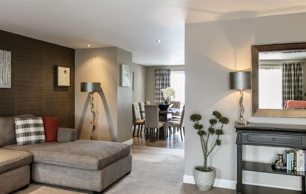 First floor:  Open plan contemporary living room leading off kitchen/dining area at Townhouse No. 7, Burneside, near Kendal