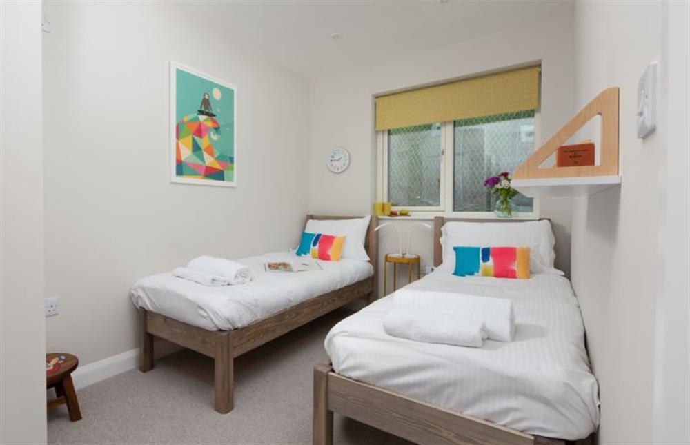 Bedroom three with twin single beds suitable for children at Tralee, Portreath
