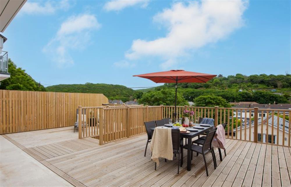 The spacious decked terrace is the perfect suntrap at Tralee, Portreath