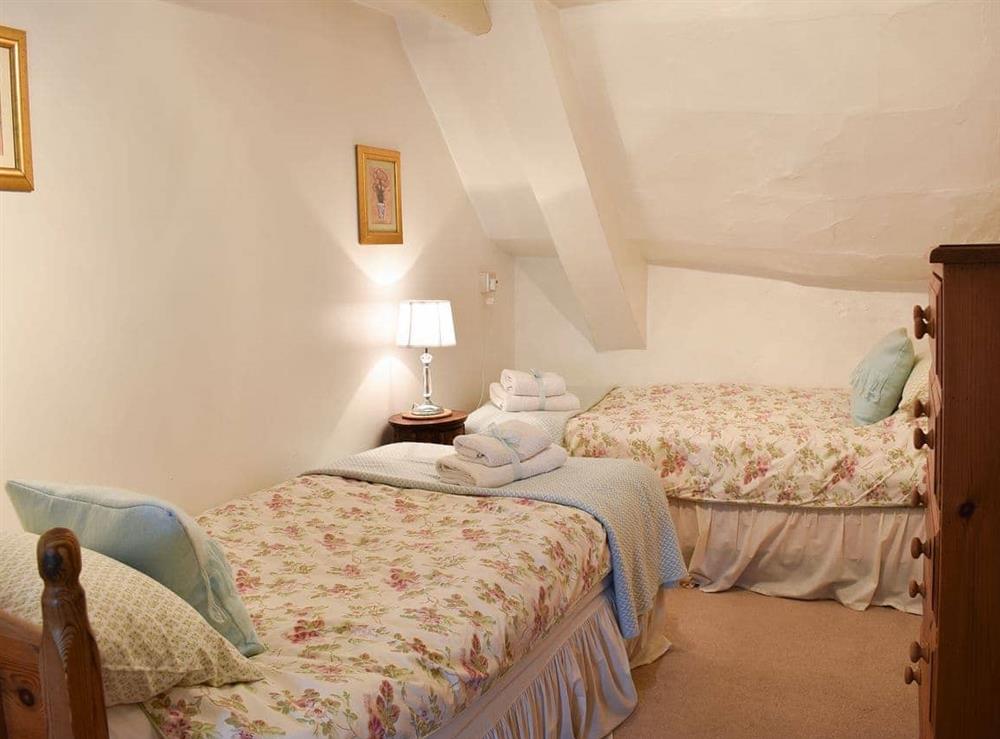 Twin bedroom at Tranquillity Cottage in Winfrith Newburgh, Dorset., Great Britain