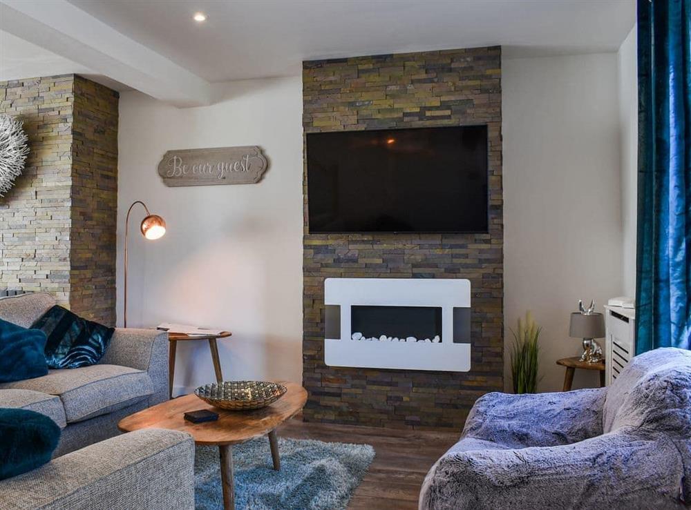 Living area at Trebarber Cottage in Newquay, Cornwall