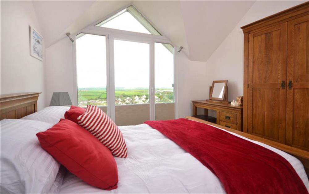 Another view of the master bedroom with blinds at Tredarloe in Salcombe