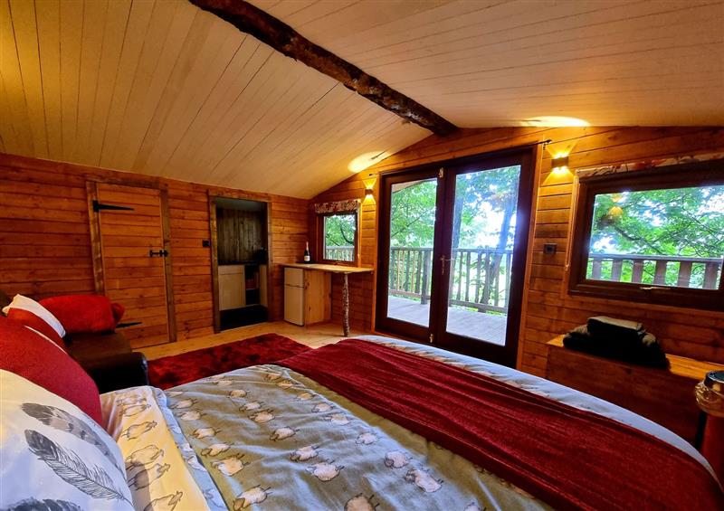 This is the bedroom at Tree House, Oakford near Aberaeron