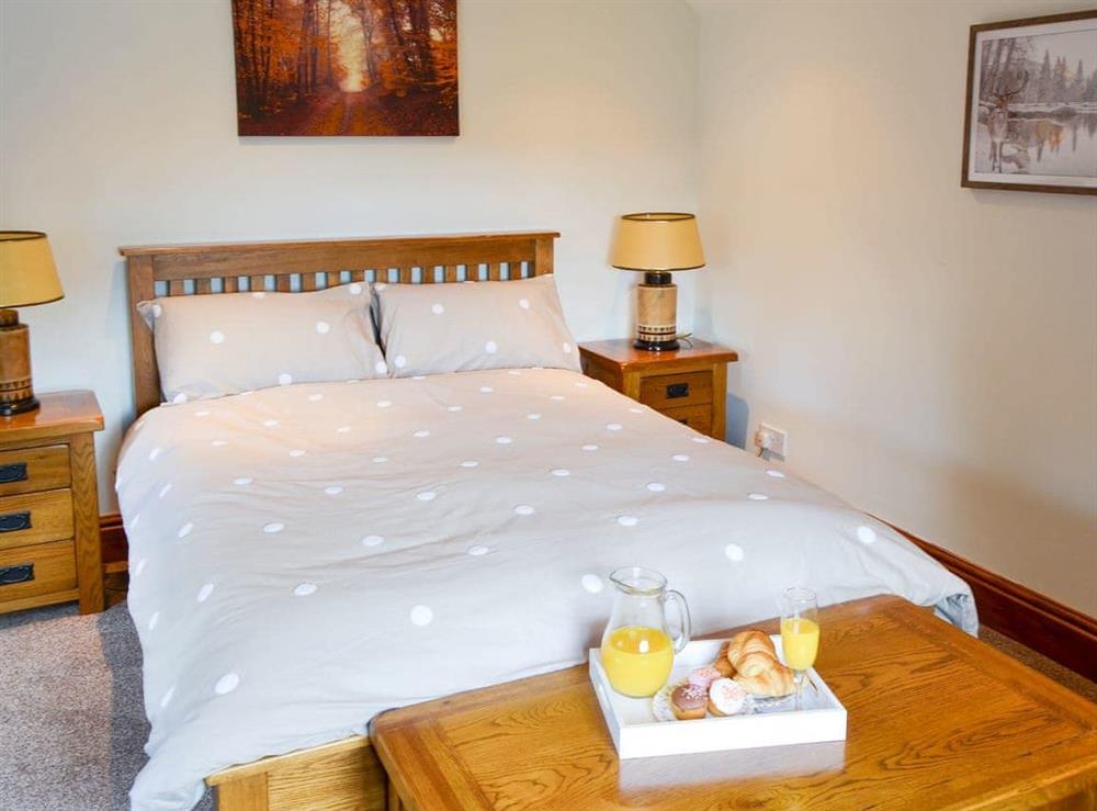 Double bedroom at Tree Tops Cottage in Mundford, Norfolk