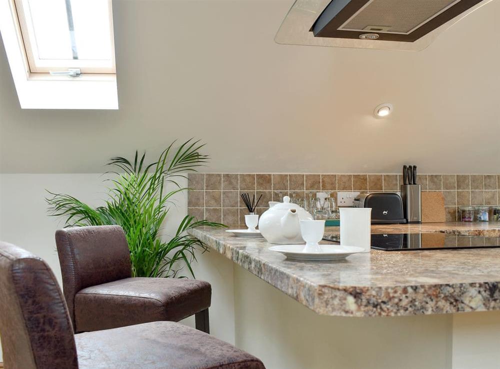 Breakfast bar area at Tree View Lodge in Uggeshall, Suffolk