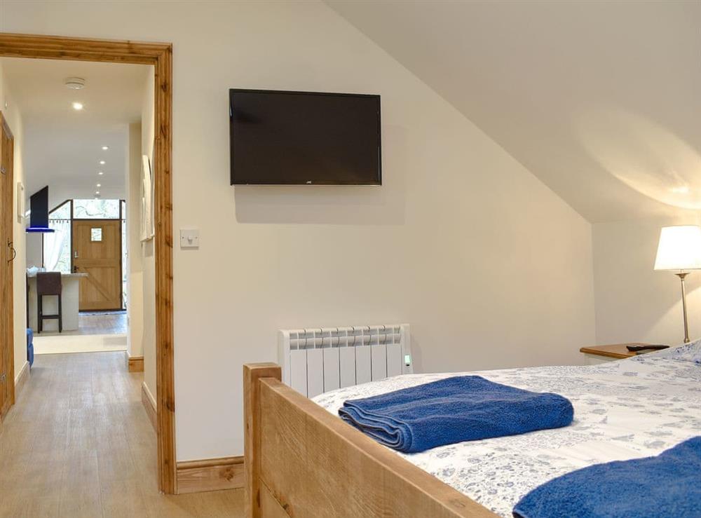 Comfortable double bedroom at Tree View Lodge in Uggeshall, Suffolk