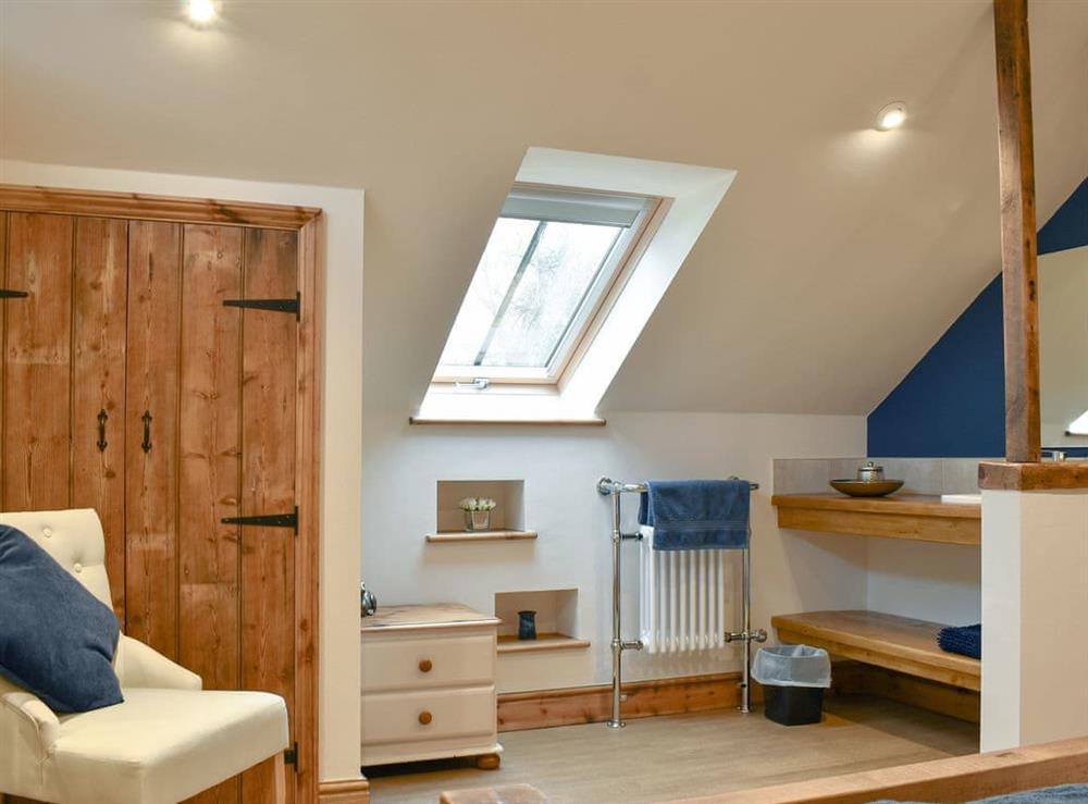 Double bedroom with washing area at Tree View Lodge in Uggeshall, Suffolk