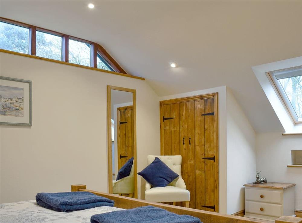 Spacious bedroom at Tree View Lodge in Uggeshall, Suffolk