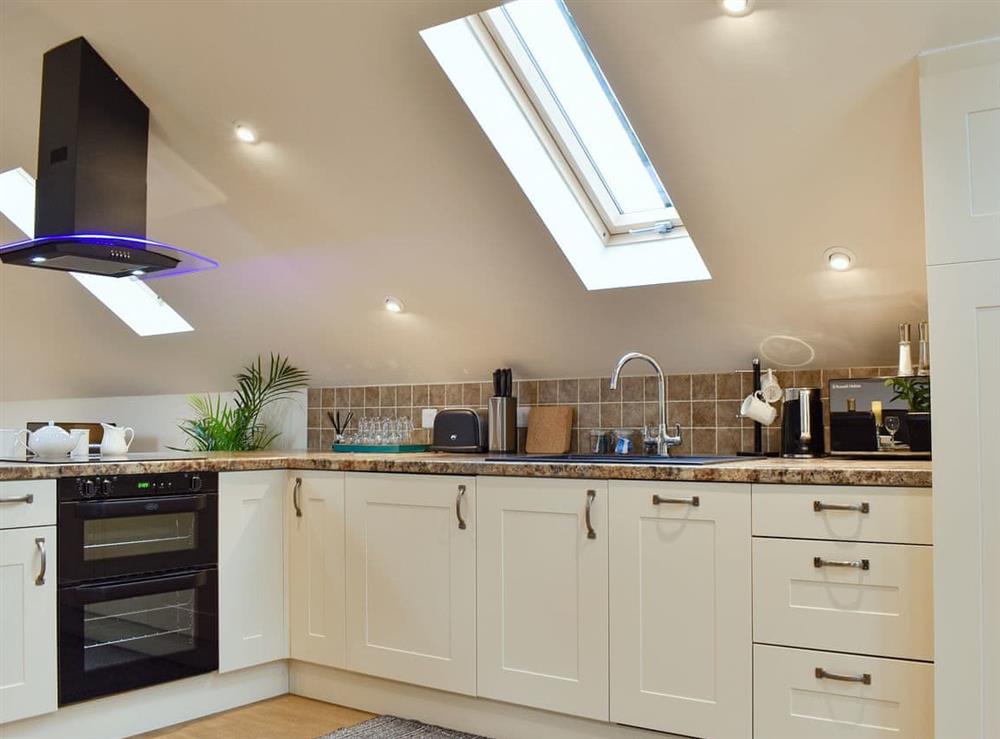 Well equipped kitchen at Tree View Lodge in Uggeshall, Suffolk